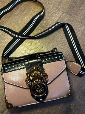 lion hardware rose-colored bag